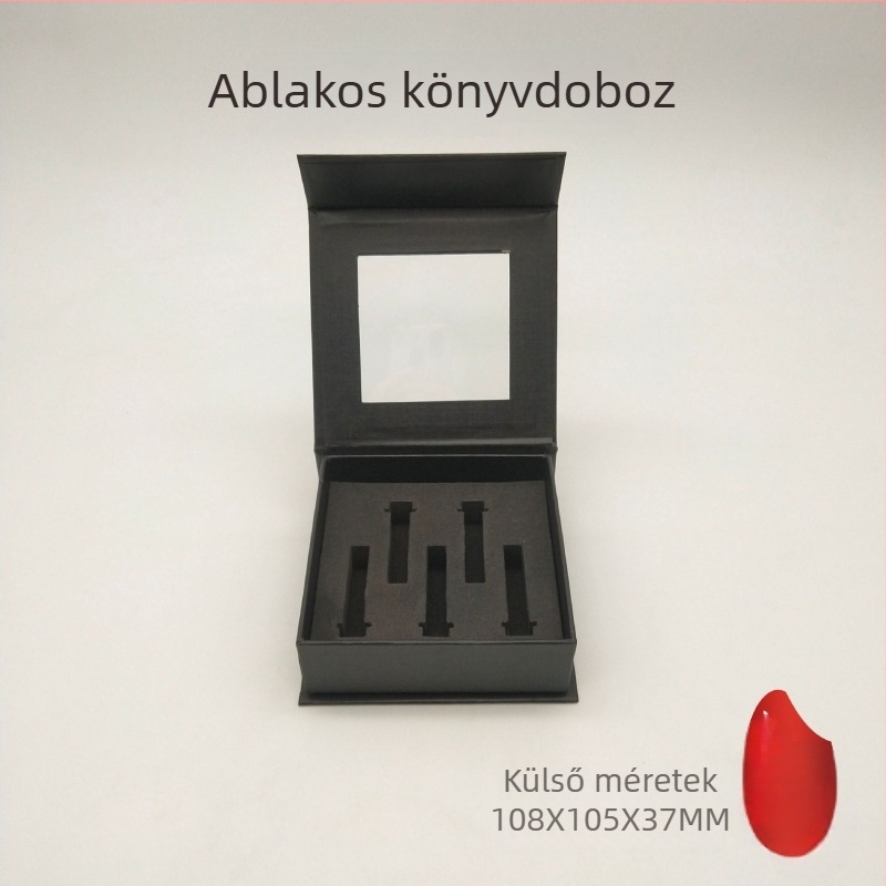 Fekete karton doboz ablakkal és nyitható fedéllel, mágneses könyv alakú belső USB-memóriához és Bluetooth fejhallgatóhoz