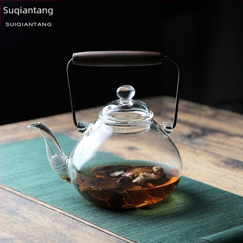Japán stílusú, hőálló üvegből készült teáskanna fa fogantyúval és emelő füllel a tea készítéséhez