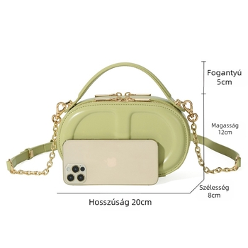 Valódi bőrből készült ovális doboz formájú, kis méretű válltáska, vállon vagy crossbody hordozható, városi stílus.