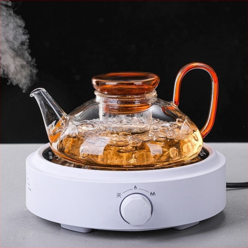 Színes üvegből készült teáskanna szűrővel, tea és víz elválasztásával, egyszerű modern dizájn otthoni használatra