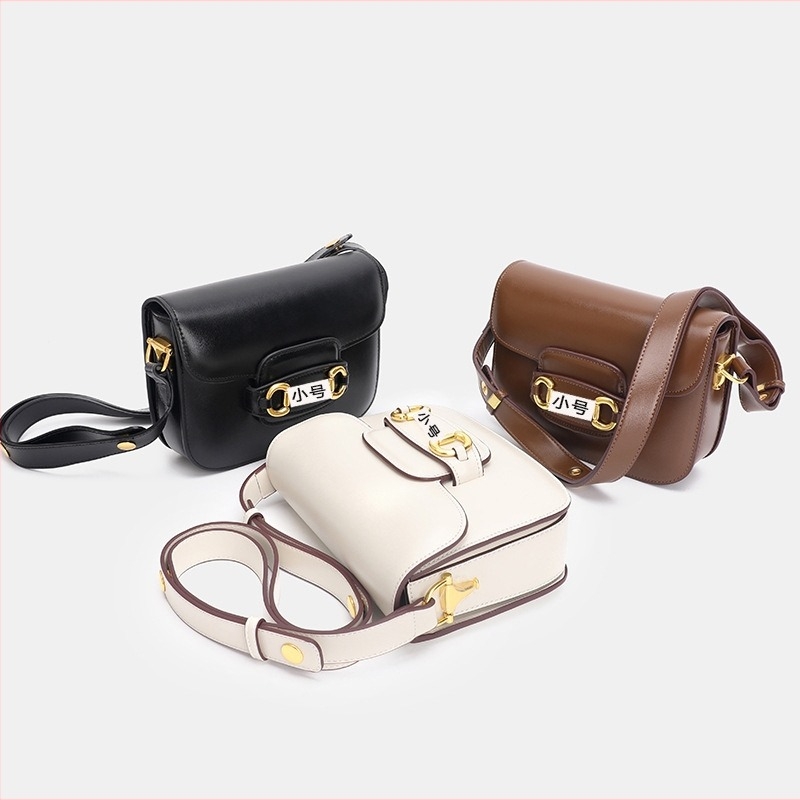Női valódi bőrből készült saddle táska, retro stílus, új 2026-os modell, sokoldalú váll- és crossbody táska.