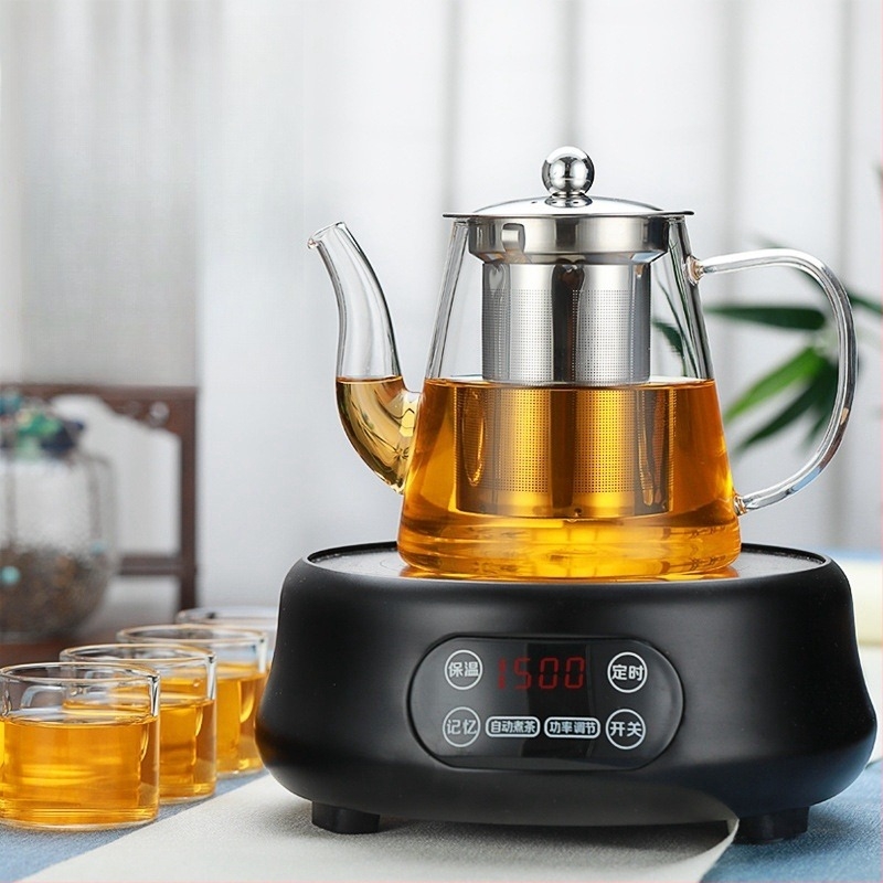 Ívelt szájú, egyenes testű teáskanna, tea–víz elválasztóval, mindennapi otthoni használatra, hőálló boroszilikát üveg