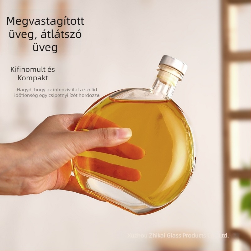 Kreatív kör alakú üveg a hideg tea készítéséhez, átlátszó italosüveg logónyomási lehetőséggel, üres adagolható üveg