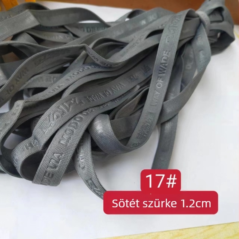 Vékony, puha kötött szalag 10 mm-es domborított betűkkel a gallérhoz