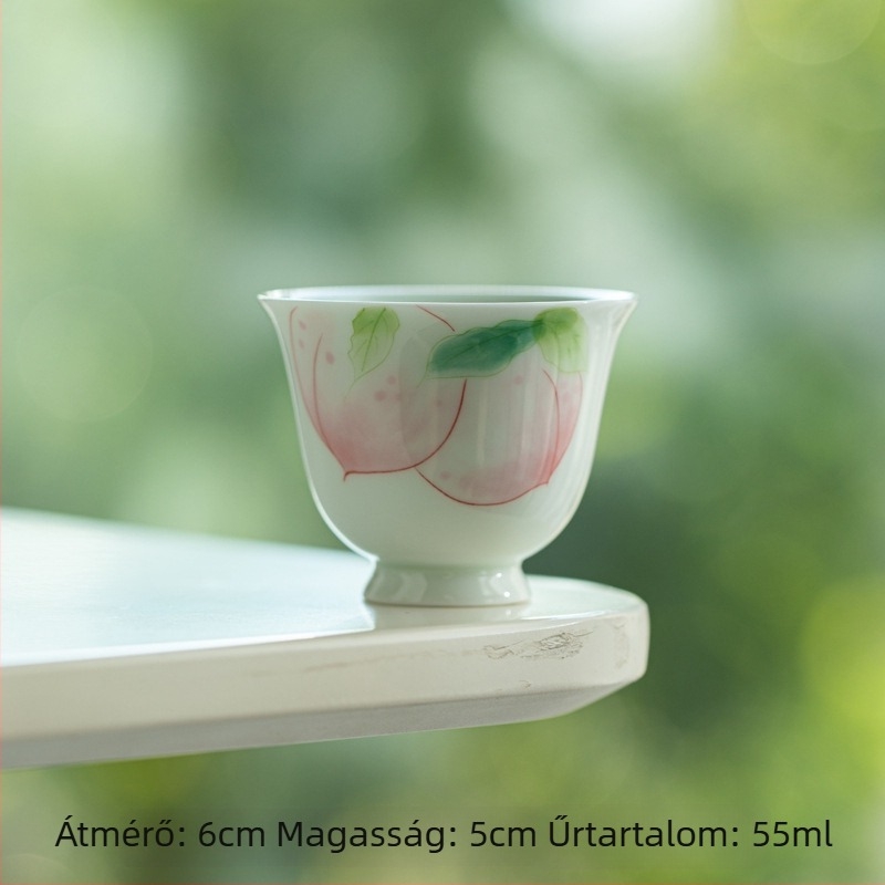 Türkiz-zöld kézzel festett teáscsésze fehér porcelánból, magas talppal, aláglazúros díszítés, friss és aranyos dizájn