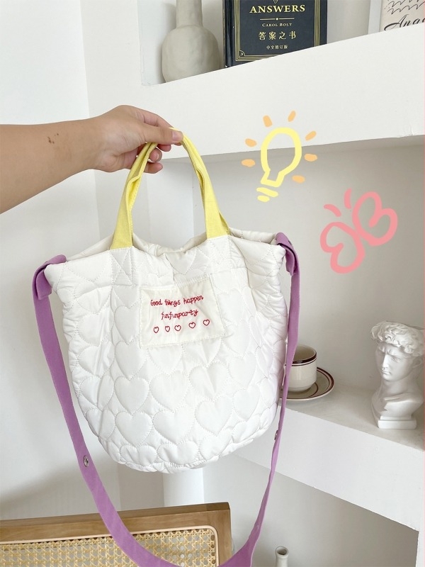 Lila kviltált crossbody bucket táska, nagy méret, puha pamut anyag, vászon bélés, hengeres forma, mágneses záródás