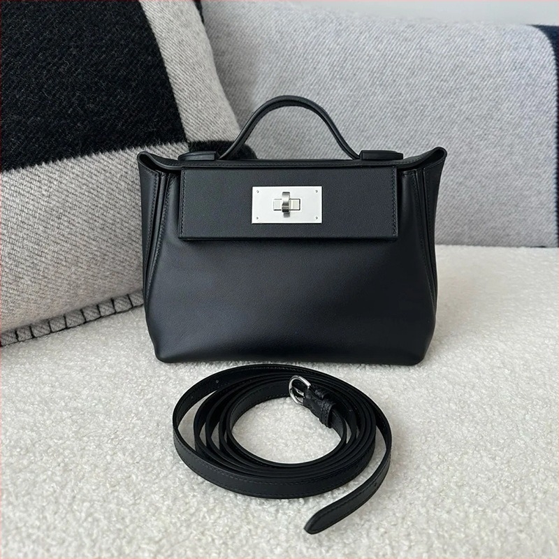 Első réteg marhabőrből készült kézitáska zárócsattal, keresztpántos, kompakt mindennapi és üzleti használatra