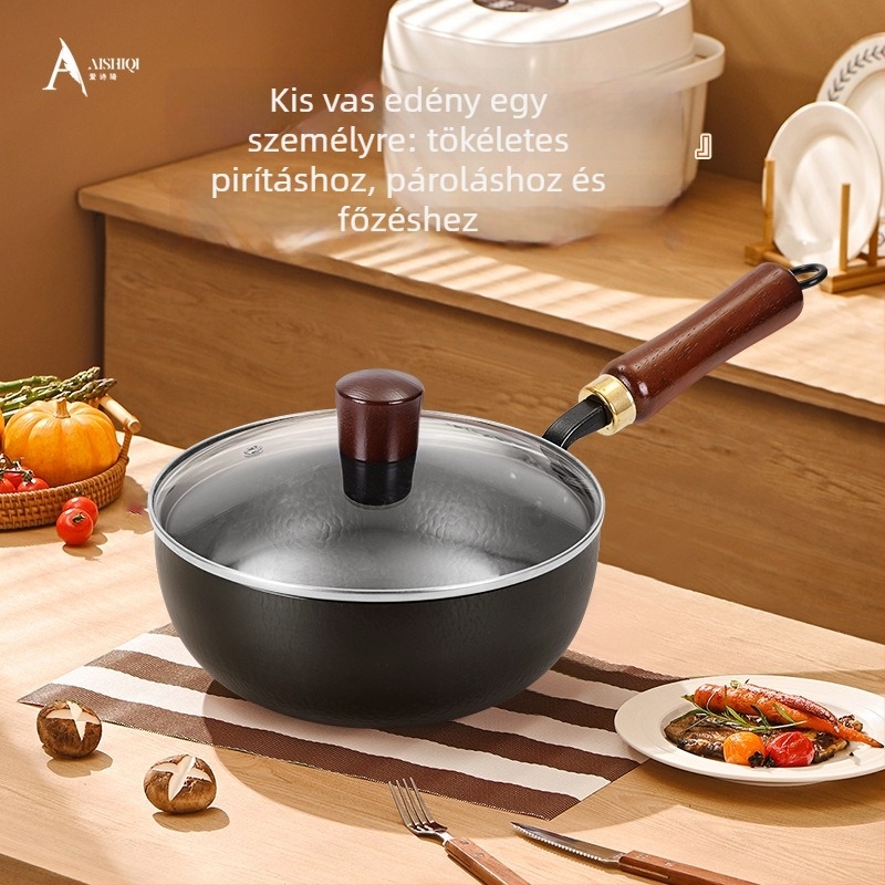 Kézzel kovácsolt kis vas edény egy adagos kiszolgáláshoz, tojás és steak sütőedény üvegfedővel, modern minimalista dizájn