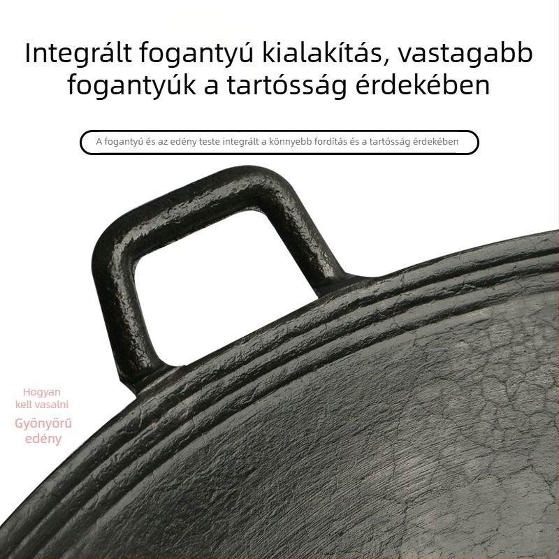 Kétfülű öntöttvas edény otthoni használatra, hagyományos vidéki fatüzelésű konyhához.