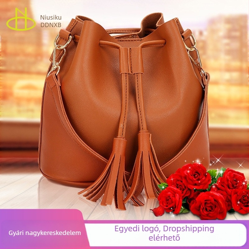 Női PU táska, koreai stílusú bucket bag, tassel díszítéssel, egy vállon hordható keresztpánttal, új modell 2026