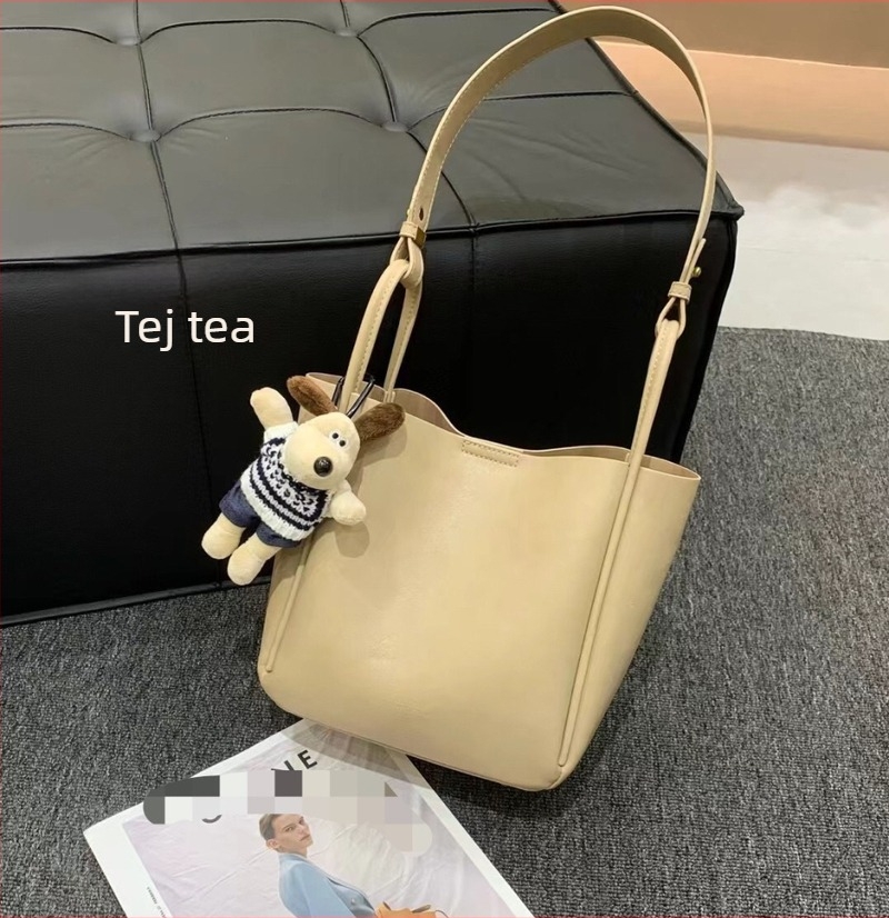 Niche designú női bucket táska, minimalist Bőr kézitáska, őszi-téli 2025, retro városi crossbody egy vállon