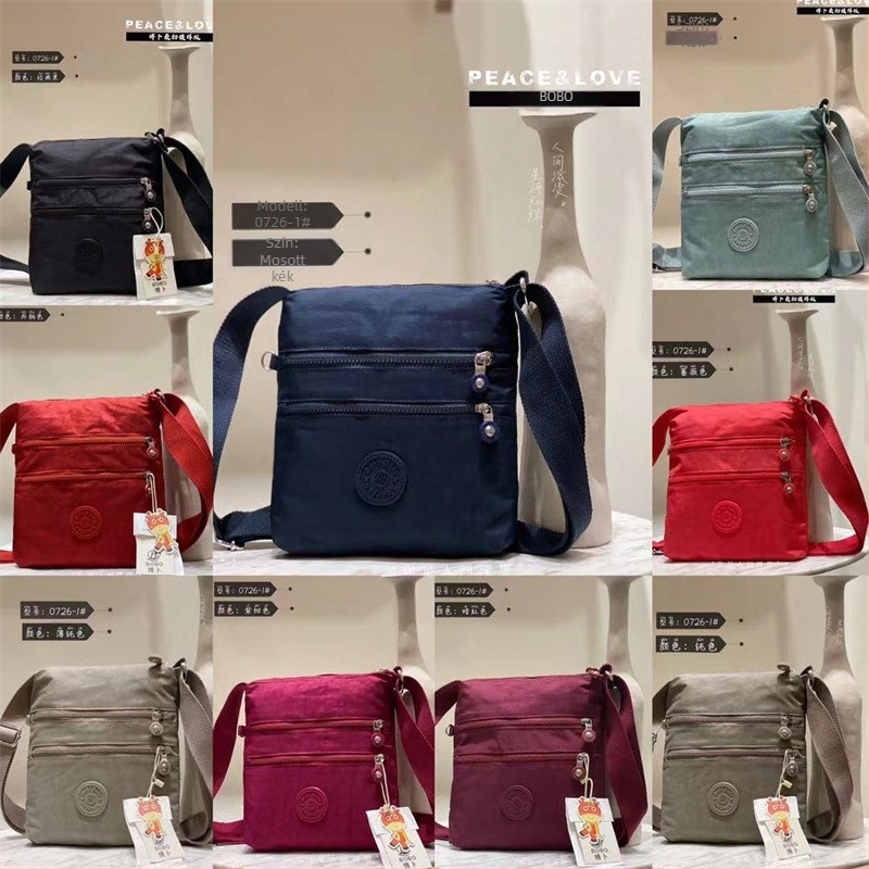 Női több rekeszes crossbody táska Oxford anyagból, vízálló, kompakt függőleges négyszögletes formájú, mindennapi használatra