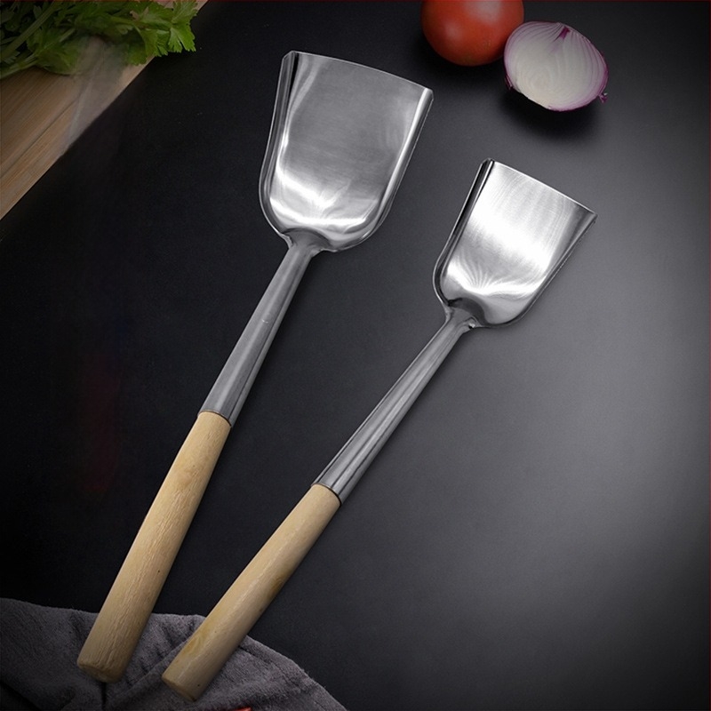 Fakanalas spatula rozsdamentes acél fejjel, fa nyelű konyhai eszköz
