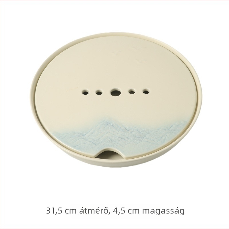Krémszínű kerámia teáskészlet, fedős teáskannával, infúziós tálcával, 6 csészével és teás tálcával.