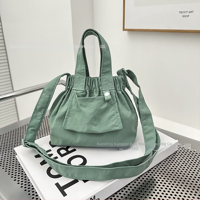 Ősz 2025 Mini nylon színblokkokkal díszített bucket crossbody táska nőknek