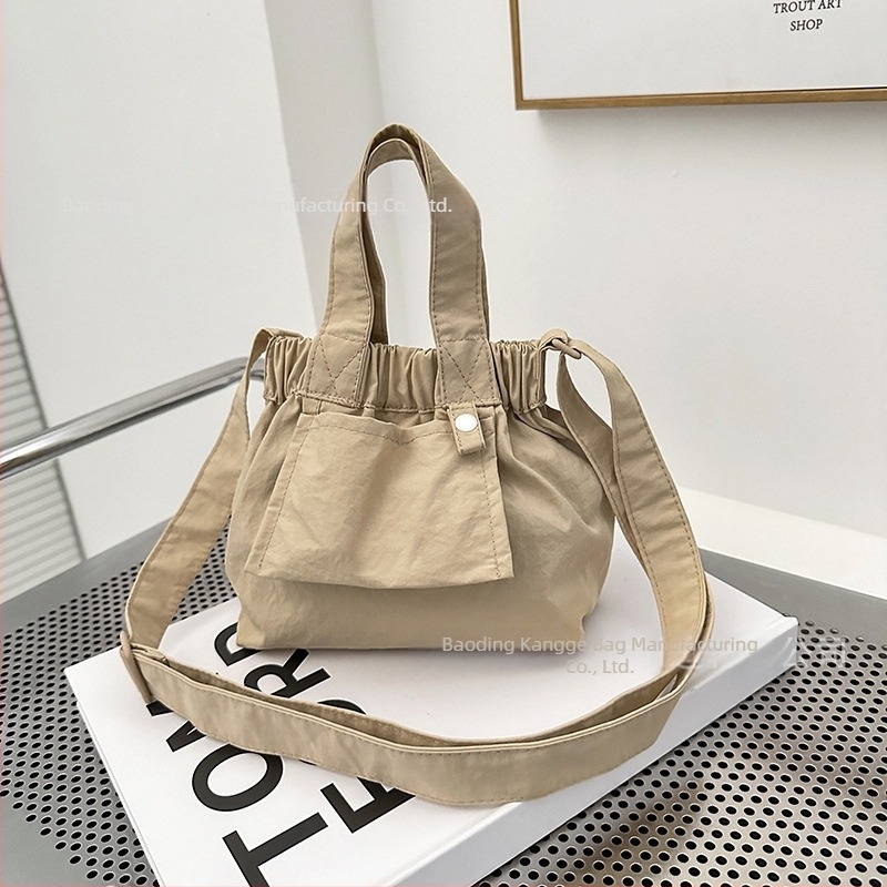 Ősz 2025 Mini nylon színblokkokkal díszített bucket crossbody táska nőknek