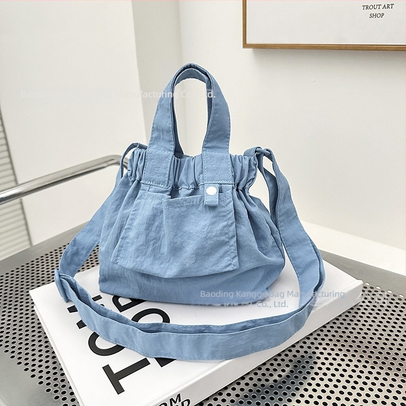 Ősz 2025 Mini nylon színblokkokkal díszített bucket crossbody táska nőknek