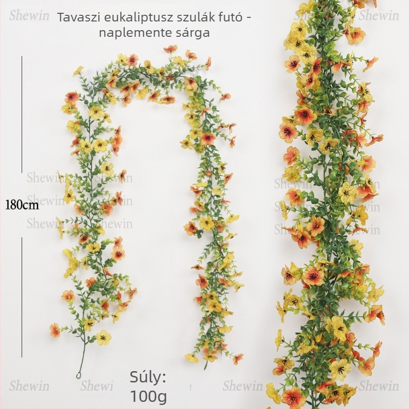Mű virágokkal díszített lila szőlőindák, otthoni dekoráció