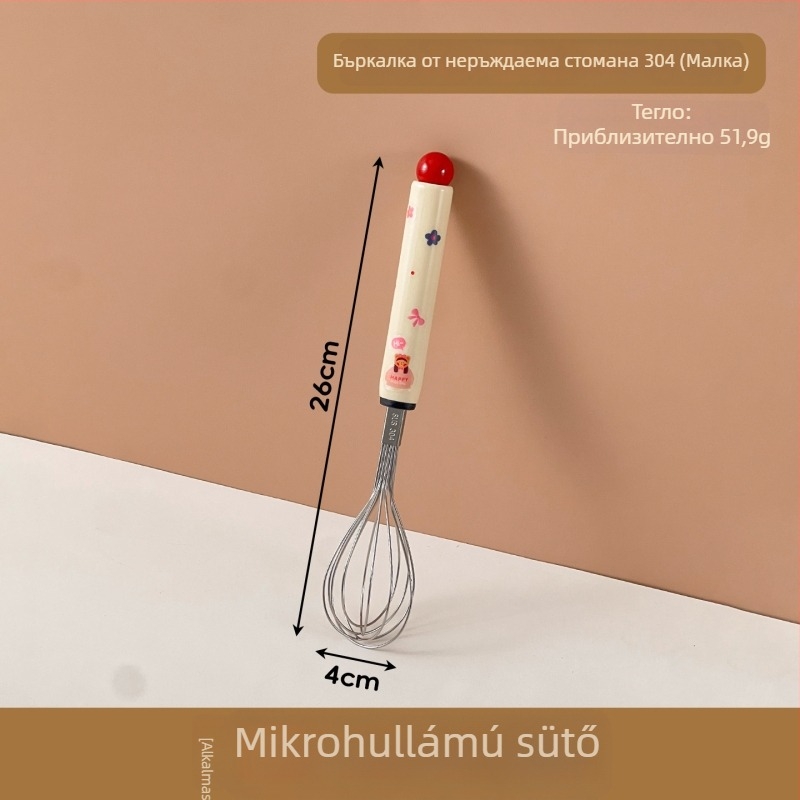 Kézi rozsdamentes acél tojásfelverő – rajzfilm-stílusú markolattal – tojás és tejszín felverésére, háztartási sütőeszköz.