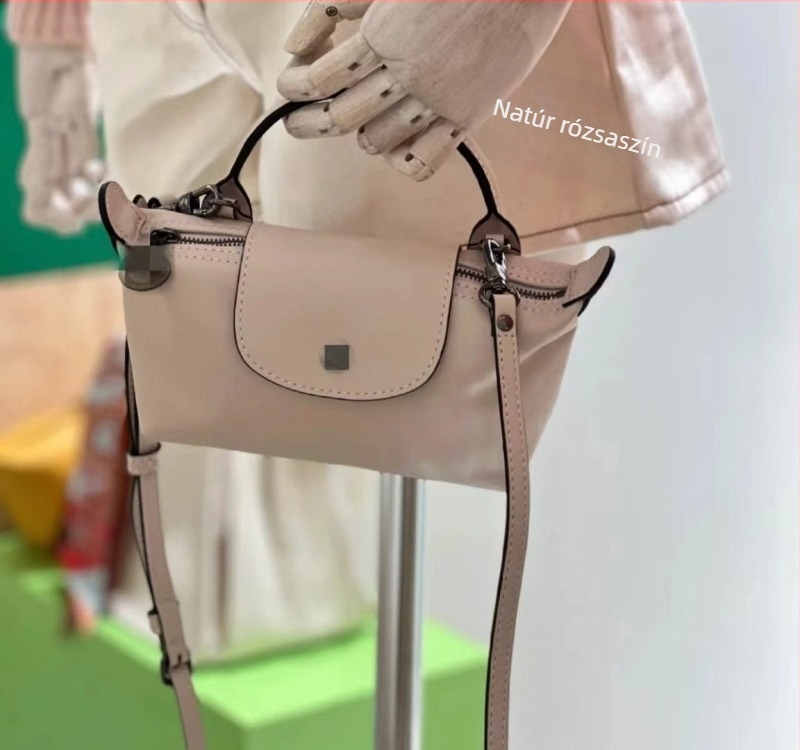 Mini PU dumpling táska egyetlen fogantyúval; hordható vállon vagy crossbody-stílusban; kompakt női táska telefon és kozmetikumok számára.