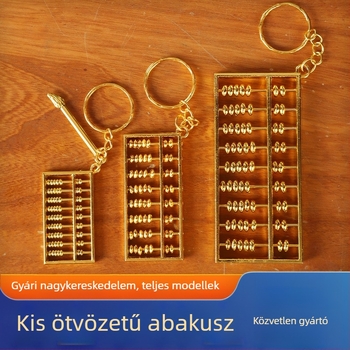 Abakus kulcstartó ötvözet, aranyozott bevonattal, utazási dísz