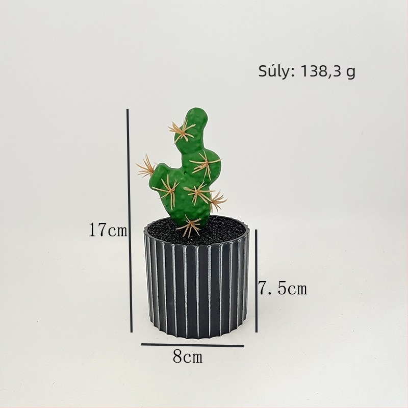 Fekete hordó alakú cserépben található mű kaktusz — irodai asztali dekoráció, mini szukkulens bonsai.