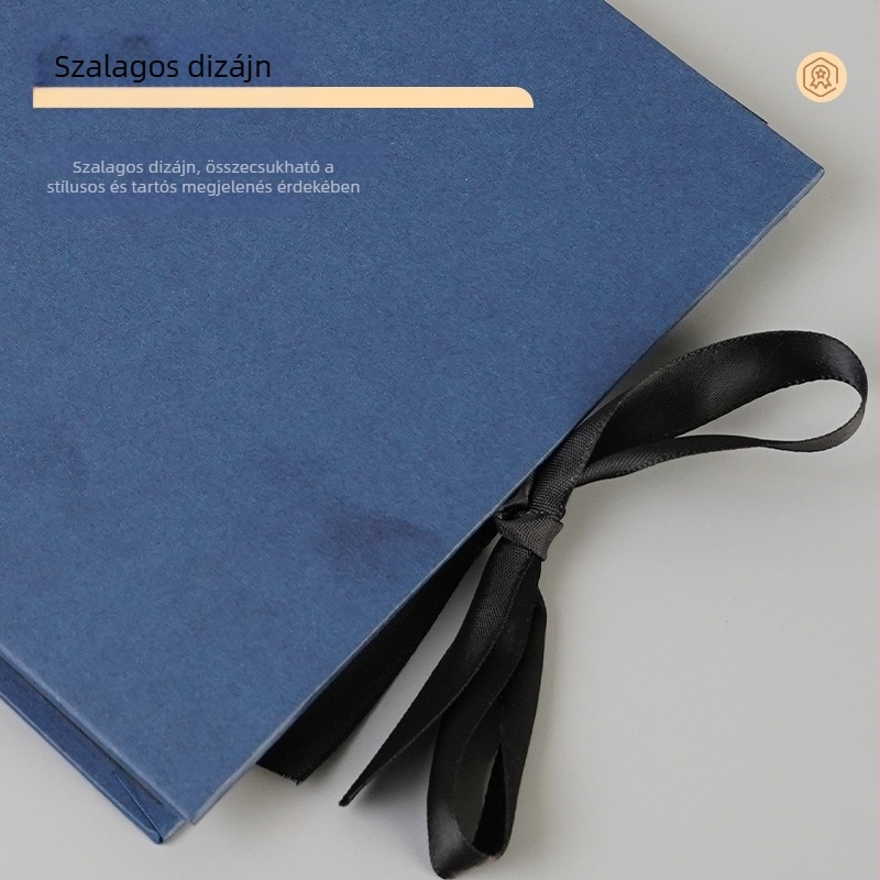 A5-ös vízszintes spirálkötéses album, kézműves papírból készült borító, DIY scrapbook masnival, 30 oldal