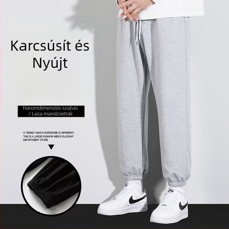 Férfi sportos, lazán szabott joggingnadrág keskeny bokavégződéssel, vékony egyszínű, őszi viselet
