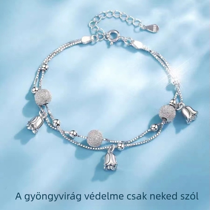Női fehér rézből készült karkötő virágmotívummal, színtartó, dupla matt felület, elegáns ékszer