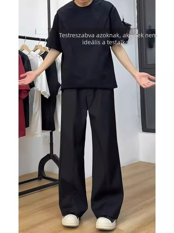 Fekete férfi öltönynadrág elegáns drapírozással, tiszta szabás, könnyű nyári anyag, egyenes szár enyhe bővüléssel