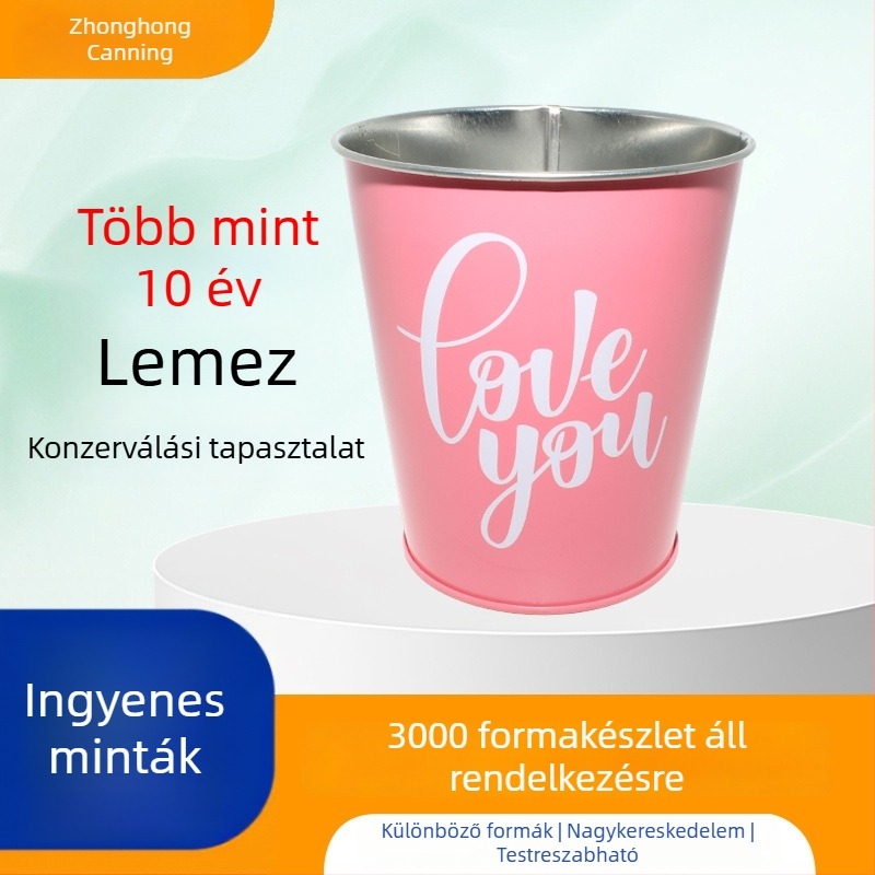Ónlemezből készült édesség kanna, kör alakú fémdoboz logóval