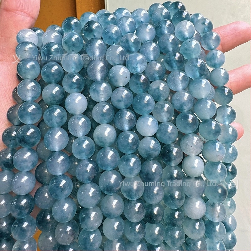 6 mm kalcedon golyógyöngyök sötétkék árnyalatban, jégszerű átlátszóság és virágos mintázat DIY karkötőhöz