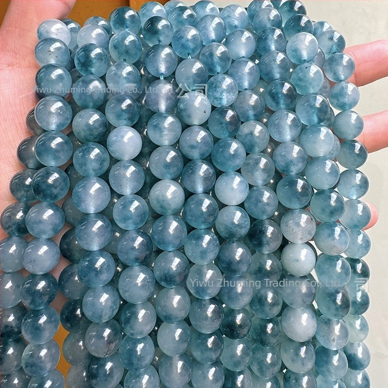 6 mm kalcedon golyógyöngyök sötétkék árnyalatban, jégszerű átlátszóság és virágos mintázat DIY karkötőhöz