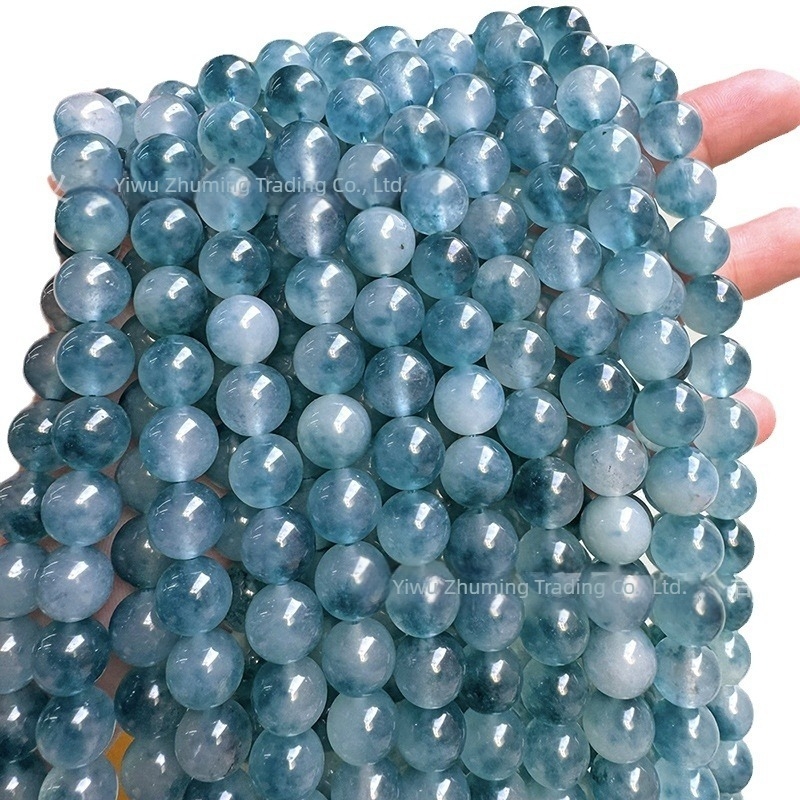 6 mm kalcedon golyógyöngyök sötétkék árnyalatban, jégszerű átlátszóság és virágos mintázat DIY karkötőhöz