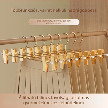 Aranyszínű fém nadrágtartó vállfa gardróbhoz, nadrág- és szoknyaklipszekkel