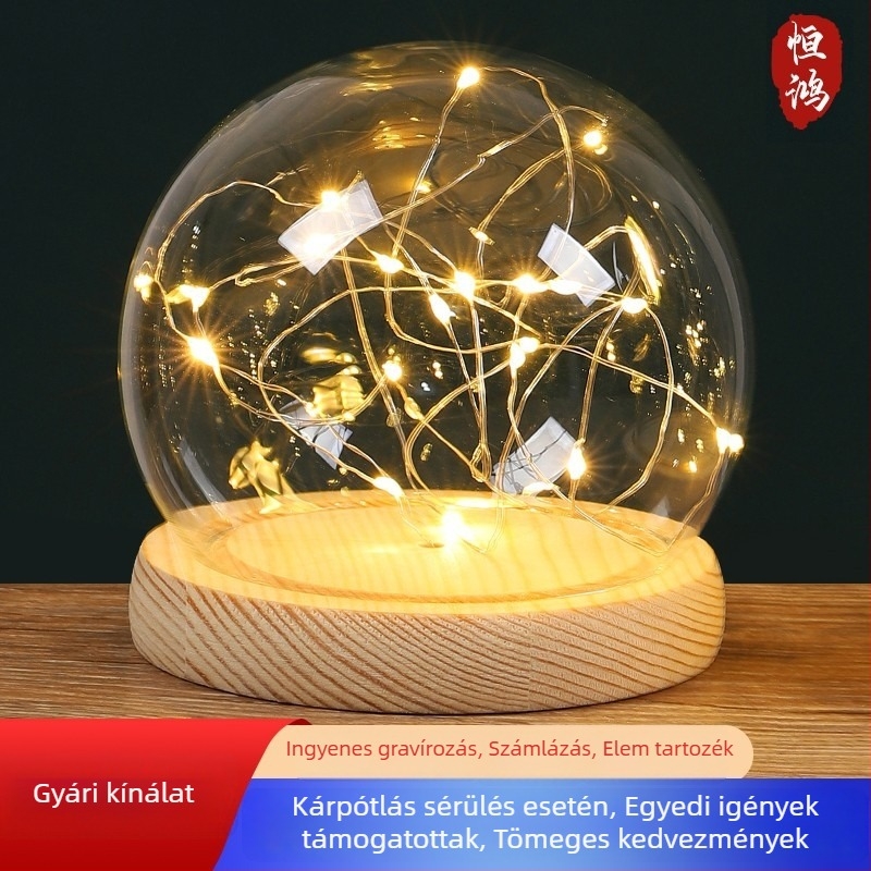 Gömb alakú üvegvitrin megőrzött és szárított virágokkal, üvegfedél, fényfüzér, dekoratív figurka, kézmodell, magas boroszilikát-üveg