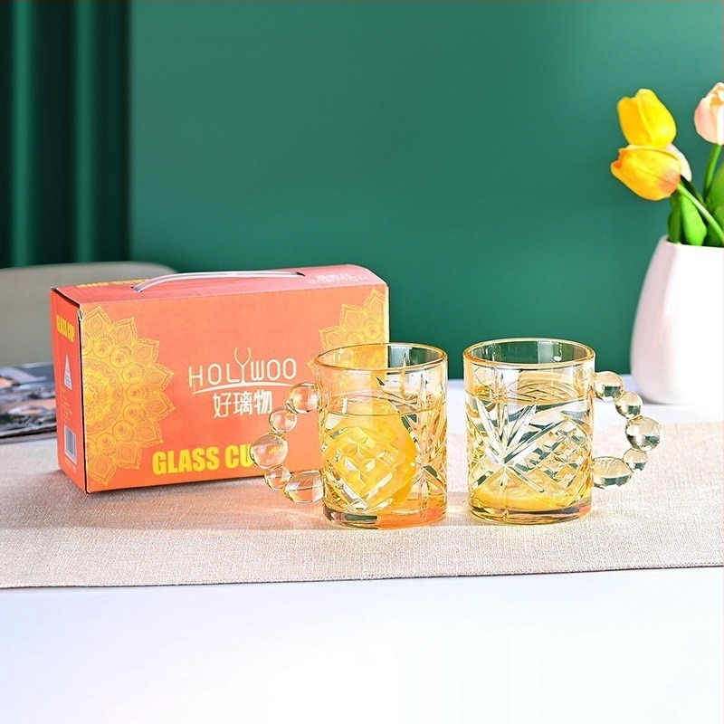 Cana de sticlă cu mâner colorat, îngroșată și rezistentă la temperaturi ridicate, cană de cafea de calitate superioară pentru uz casnic, cană de apă gravată, en-gros din fabrică