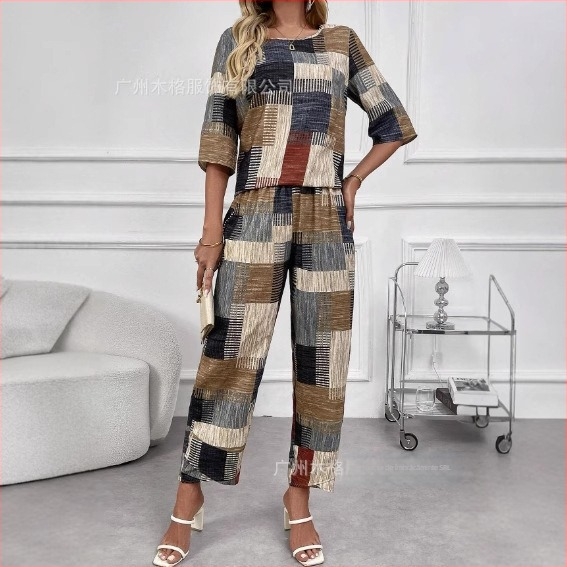 2025 Moda europeană și americană transfrontalieră Noua vară model geometric cu mânecă scurtă top și costum de pantaloni de morcov