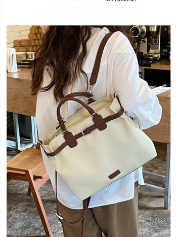 Geantă de laptop din nylon pentru femei – impermeabilă, capacitate mare, stil urban minimalist, purtare crossbody sau ca geantă de umăr, lansare primăvara 2025