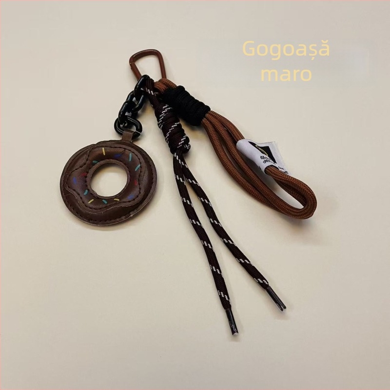Pandantiv pentru geantă, în formă de donut, cu model fructat, din nylon; stil: tendințe naționale și nou stil (Nylon; Model fructat; Stil: Tendințe naționale și nou stil; Sezon: Iarna 2024)