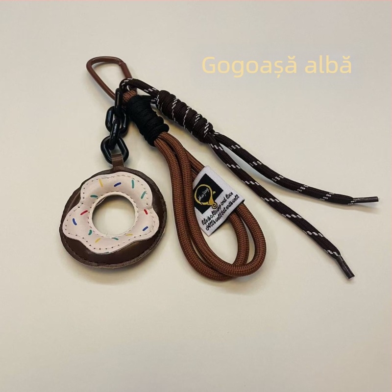 Pandantiv pentru geantă, în formă de donut, cu model fructat, din nylon; stil: tendințe naționale și nou stil (Nylon; Model fructat; Stil: Tendințe naționale și nou stil; Sezon: Iarna 2024)