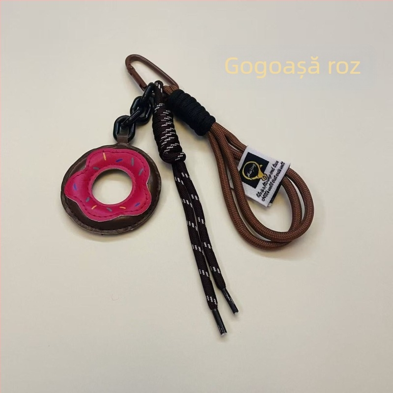 Pandantiv pentru geantă, în formă de donut, cu model fructat, din nylon; stil: tendințe naționale și nou stil (Nylon; Model fructat; Stil: Tendințe naționale și nou stil; Sezon: Iarna 2024)