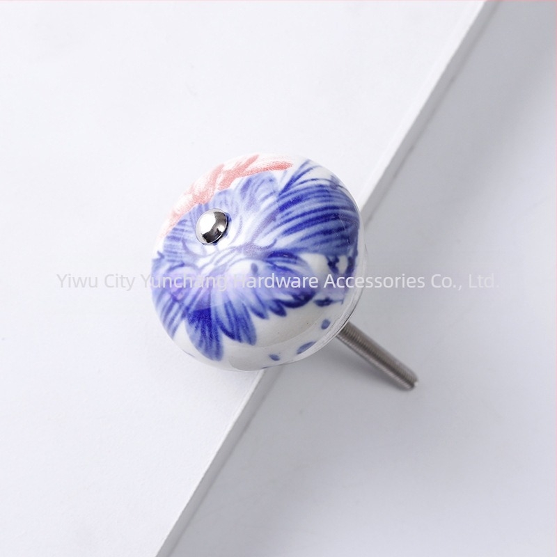 Yunchang mâner ceramic circular pentru dulapuri și sertare — stil modern minimalist, lux ușor; material ceramic; tratament de suprafață electroplatinare; marcă Yunchang Hardware.