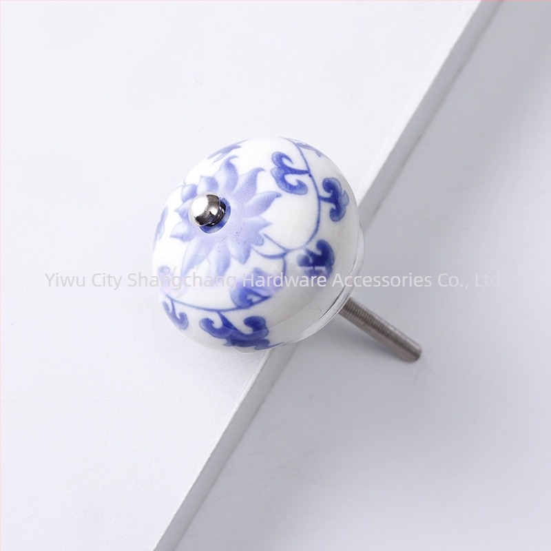Yunchang mâner ceramic circular pentru dulapuri și sertare — stil modern minimalist, lux ușor; material ceramic; tratament de suprafață electroplatinare; marcă Yunchang Hardware.
