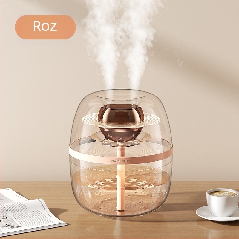 Umidificator de aer cu design cristal transparent, capacitate mare 2,6–4,0 L, potrivit pentru camere până la 30 m², 2 ieșiri de ceață, funcționare silențioasă, alimentare USB, corp circular, temporizator peste 8 ore.