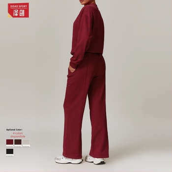 Set sport feminin all-season din nylon-elastan, 78% nylon, 22% elastan, cu bluză cu mâneci lungi și pantaloni cu talie înaltă și croi wide-leg, culoare uni, pentru alergare și fitness.