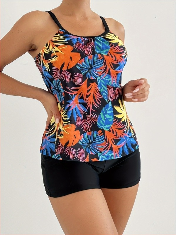 Costum de baie din două piese pentru femei, cu bretele subțiri, croială lejeră, spate decupat, imprimeu; țesătură 82% poliester, 18% elastan; cu bureți pentru bust incluși.