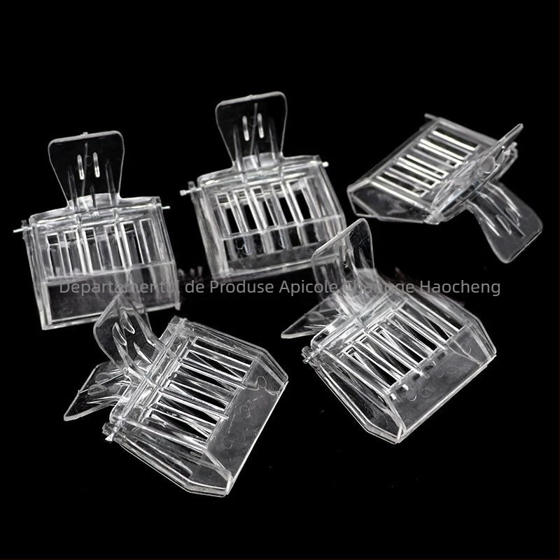 Unealtă de apicultură pentru capturarea reginei: clipsuri plastice și cuier pentru cuibul reginei, marcă Haocheng bee products business department, pentru apicultură și zootehnie