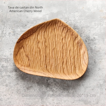 Farfurie din lemn în formă de pară, lucrată manual, texturată, din lemn masiv (Material: Nuc nord-american; Formă: pară; Finisaj: texturat; Construcție: lemn masiv; Stil: simplitate modernă)