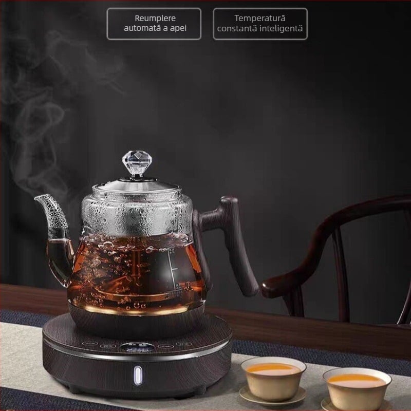 Set ceai electric cu oală de sticlă și bază ceramică, 1000–1500W, capacitate 1–2L, bază rotativă 360°, protecție împotriva uscării